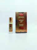 Afnan perfume oil bottle and packaging on a white background