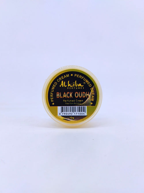 Alhiba Black Oudh perfumed cream container on a light blue background