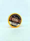 Perfumed cream container labeled 'Cobra' on a light blue background