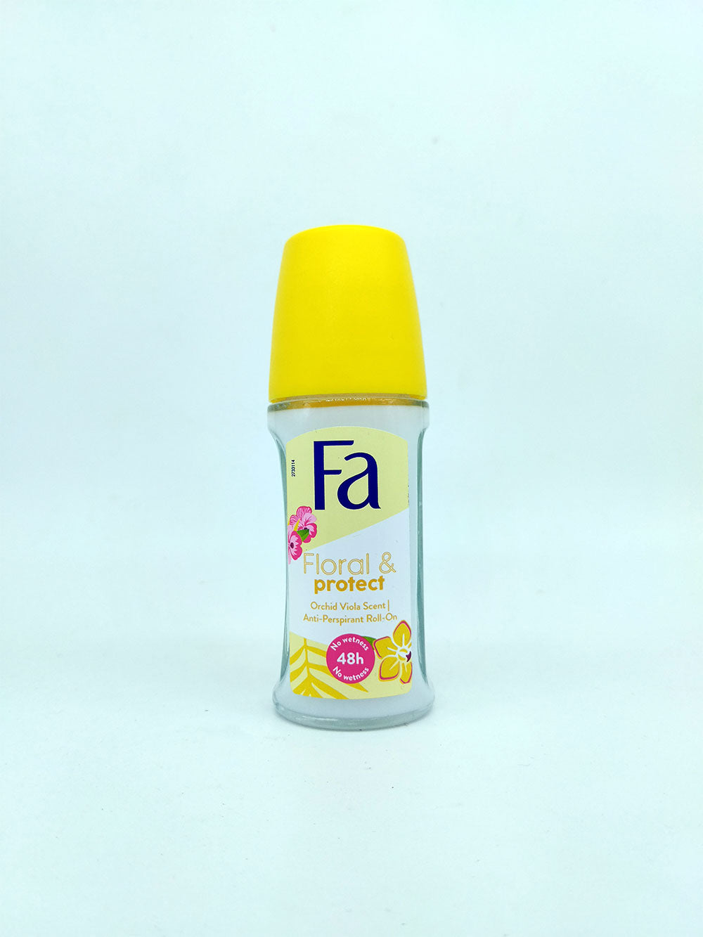 Deodorant bottle with yellow cap and white label on a light blue background