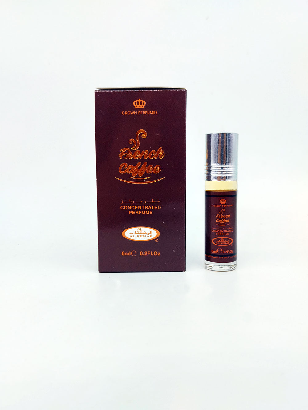 French coffee attar bottle and packaging on a white background