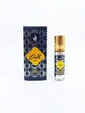 Oudh attar bottle and packaging on a white background